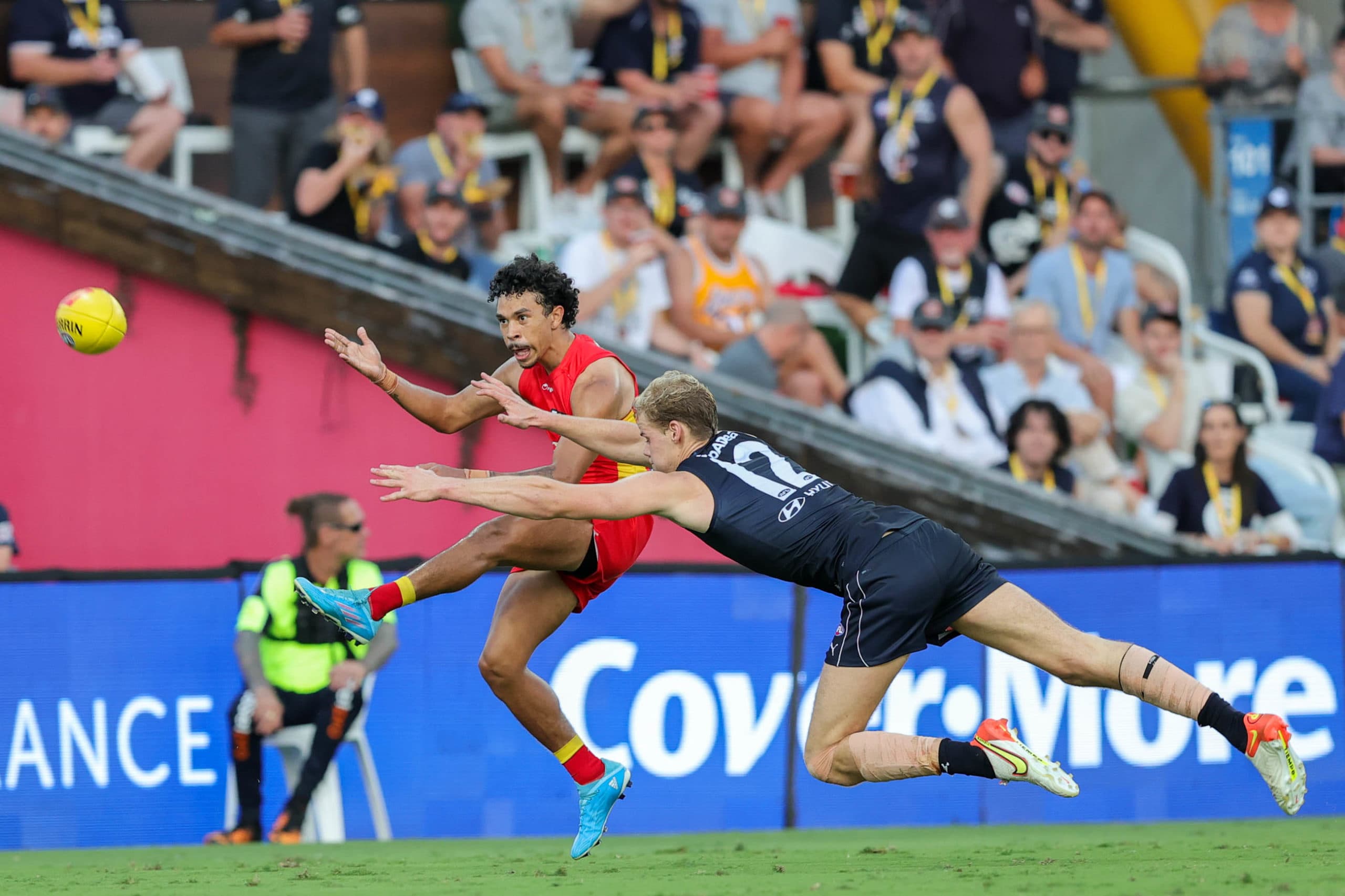 Gold Coast Suns player Malcolm Rosas kicking a goal