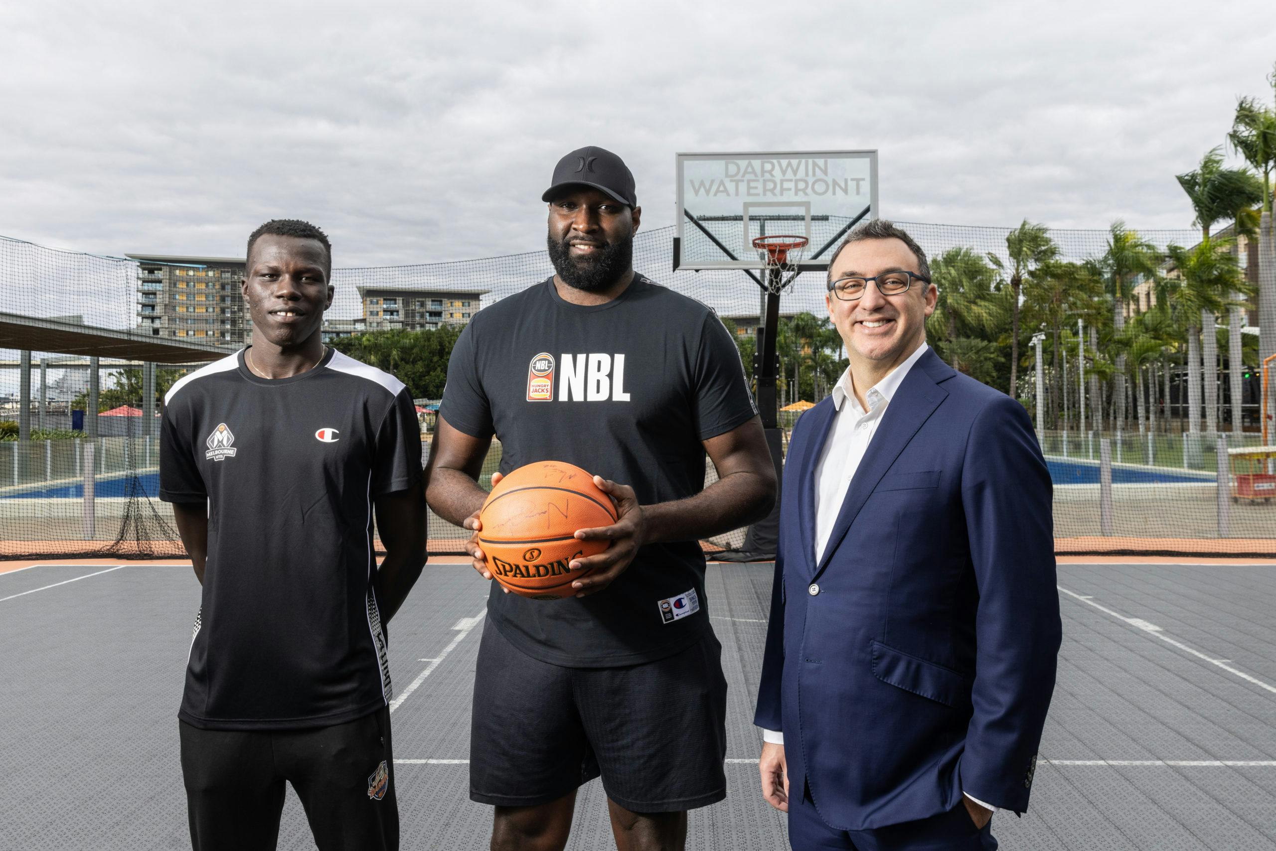 Melbourne United player Makuach Maluach, indigenous Australian basketball legend Nate Jawai and NBL Commissioner Jeremy Loeliger
