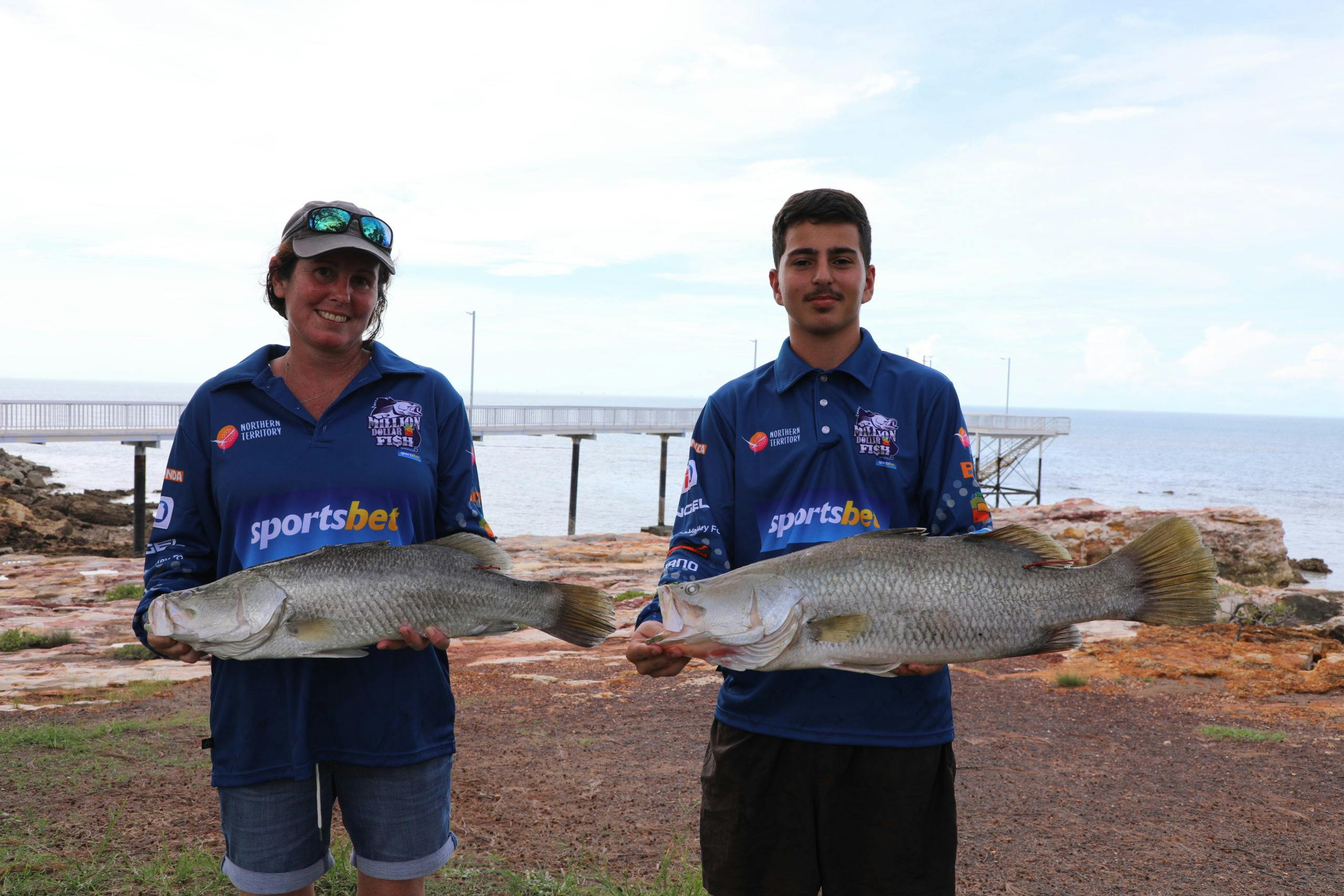 Winning fishos Tracy Coughlan and Manolis Zaroufis